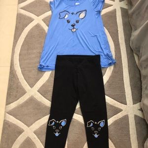 Blue shirt and black pants